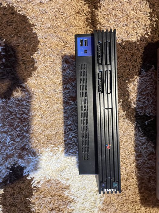 Vand consola ps 2 cu mai multe jocuri