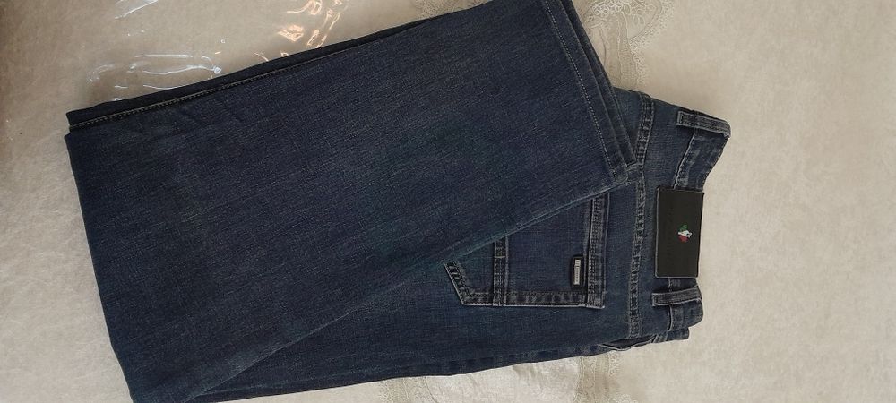 Мужеские джинсы в отличном состояние