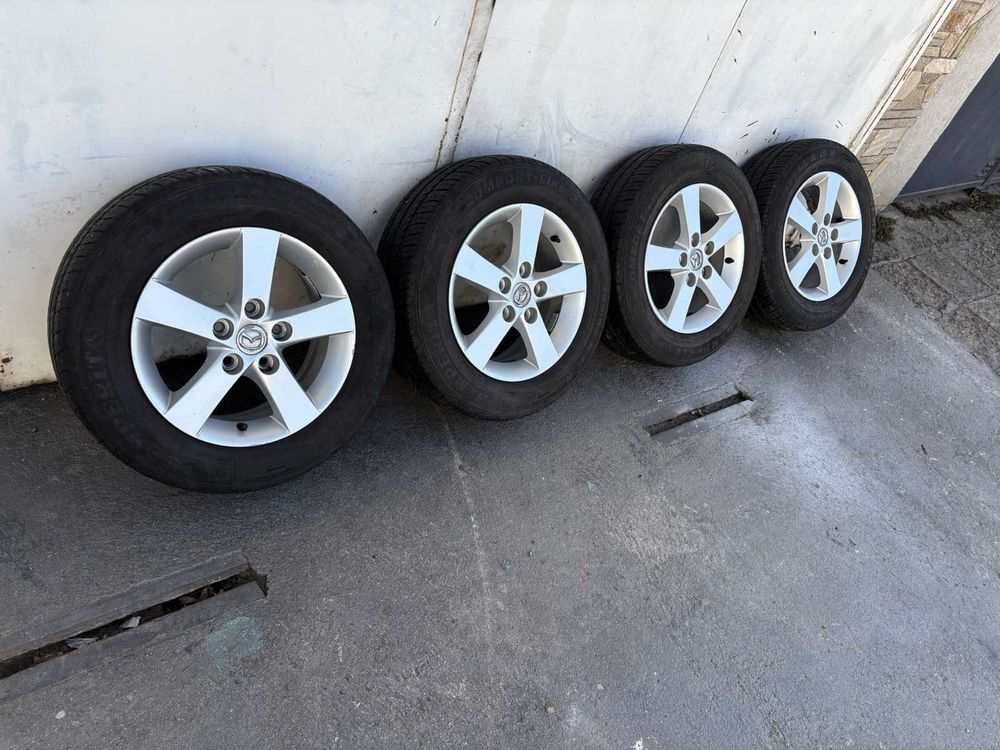 4бр. Алуминиеви джанти с гуми 195/65 R15цола от Mazda  5x114.3