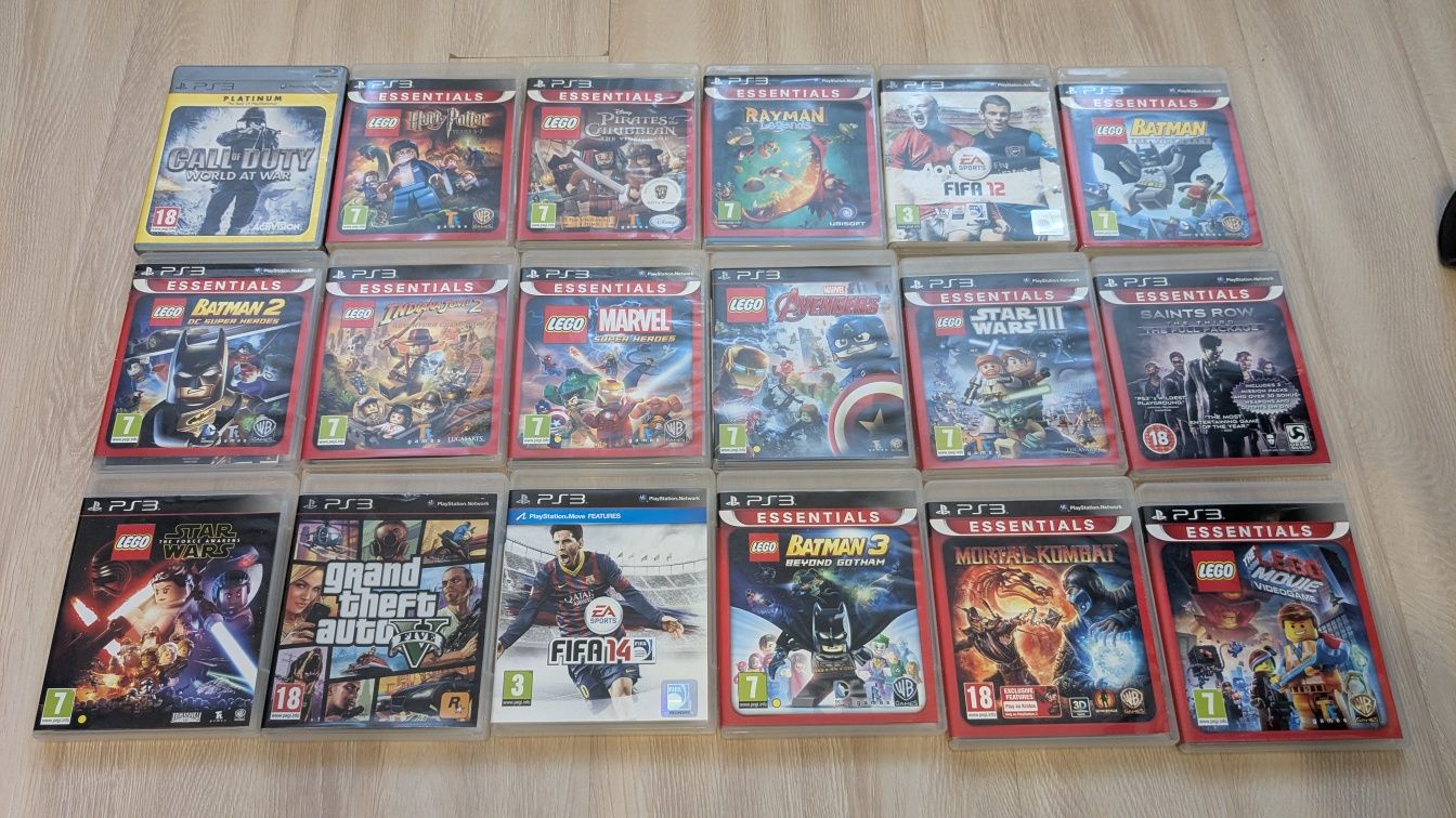 PS3 slim + 2 controllere + 18 DVD jocuri