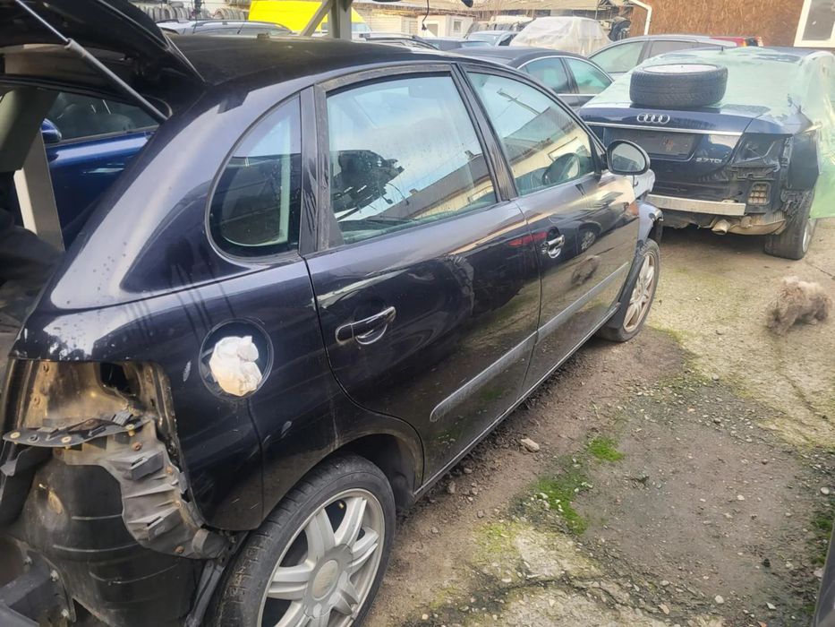 USA DREAPTA FATA/USA DREAPTA SPATE/CAPOTA FATA/HAION CU LUNETA SEAT IBIZA 2004 NEGRU/GRI