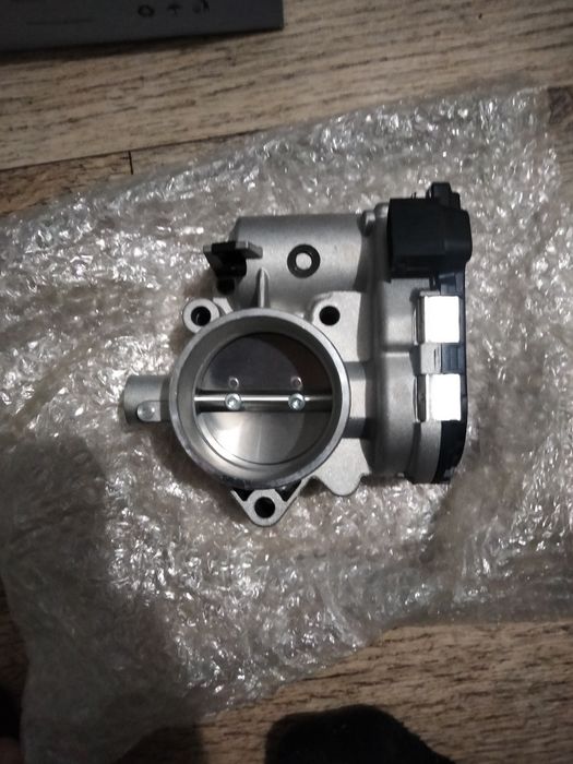 Продам дросельную заслонку