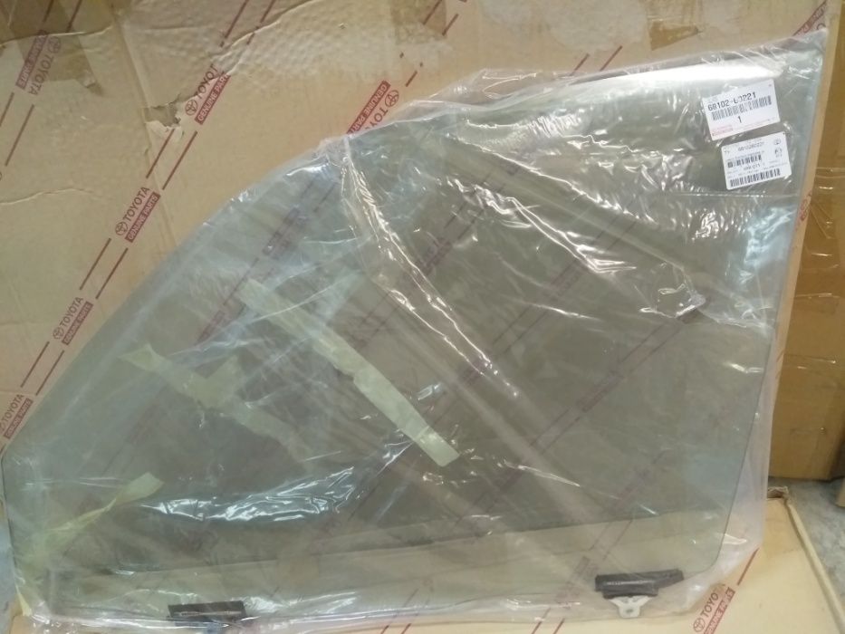 Стекло переднее левое заводское на LAND CRUISER 100,105.