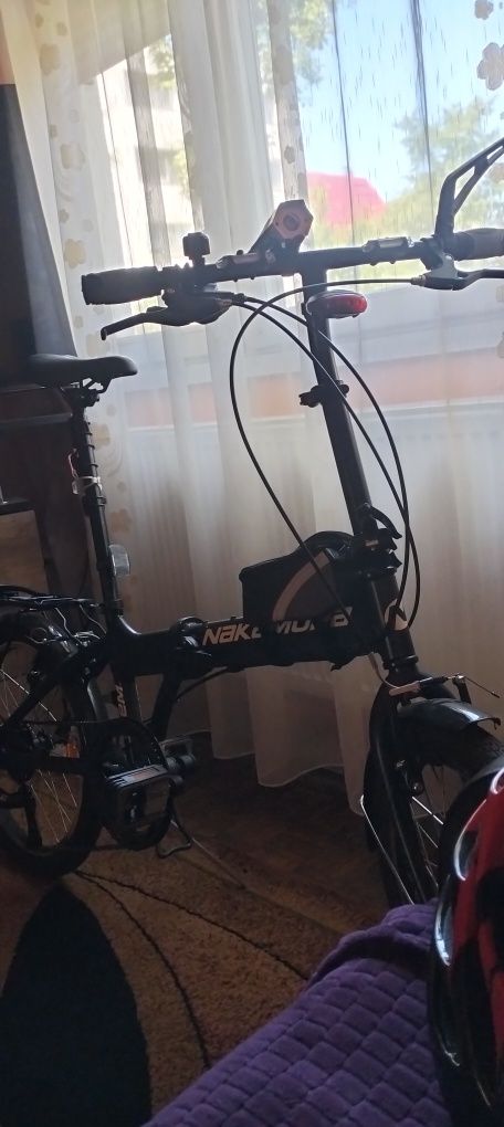 Vand bicicleta puțin rulata