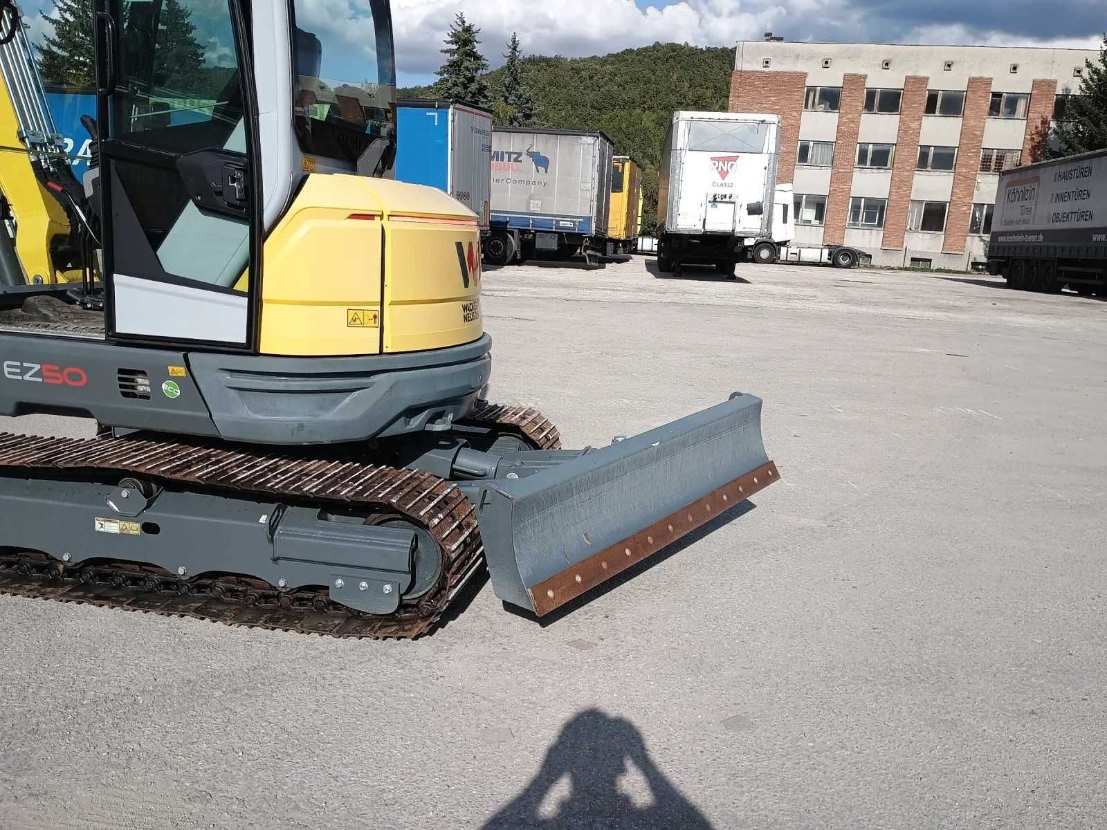 Багер Wacker Neuson