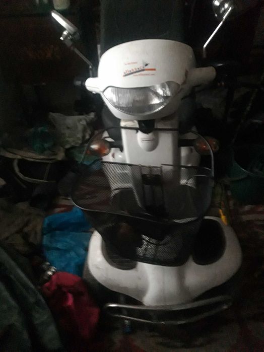Vand motoscuter pentru dizabili