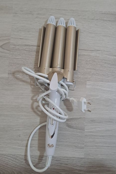 Уред за къдрици.