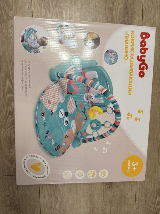 Развивающийся коврик с пианино