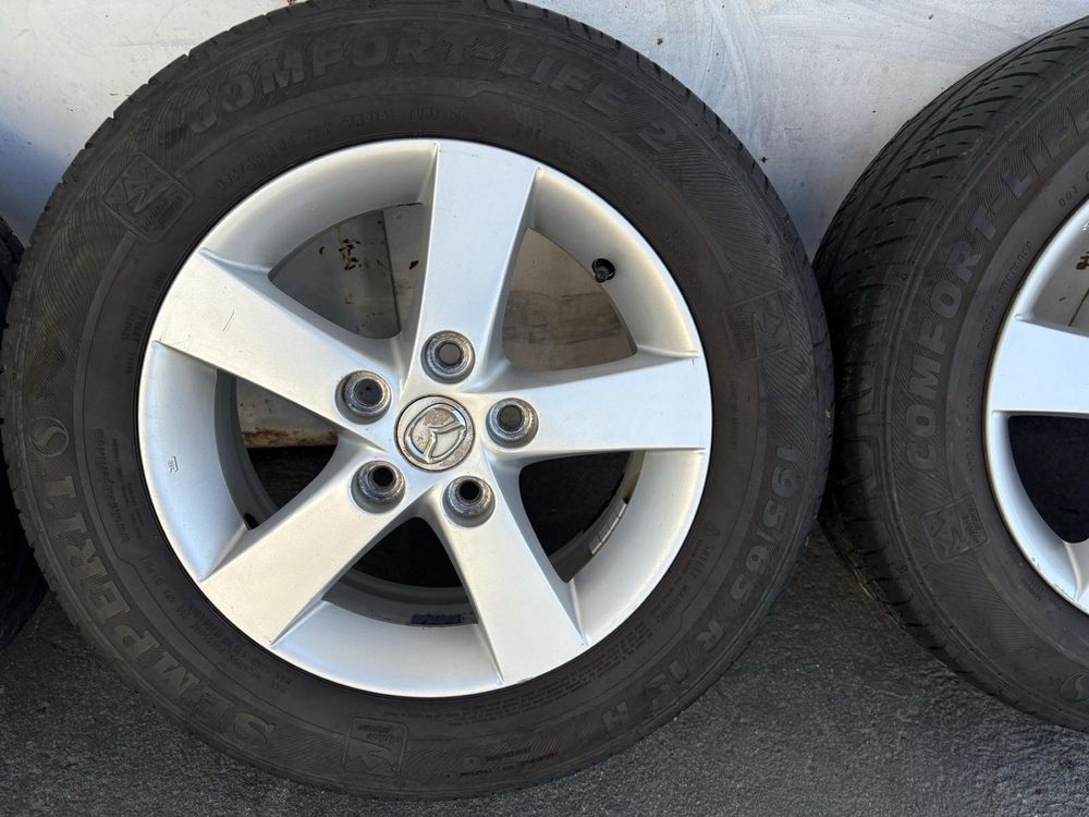 4бр. Алуминиеви джанти с гуми 195/65 R15цола от Mazda  5x114.3