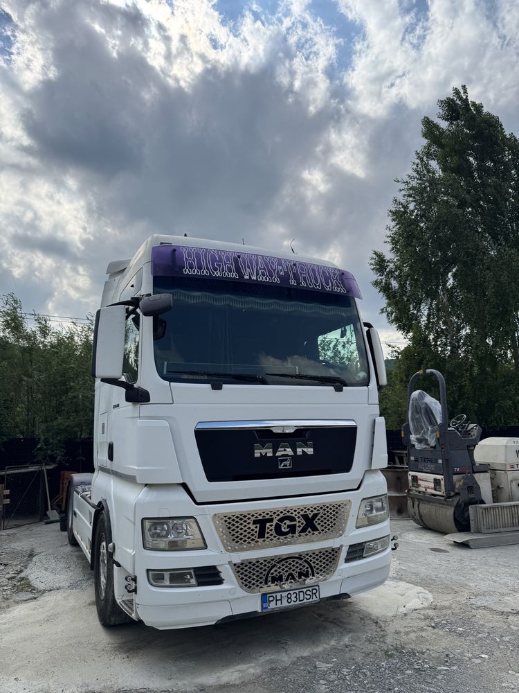 Cap tractor man TGX18.440