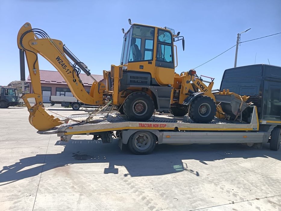 Buldoexcavator WOLF an 2020 cu doar 100 ore