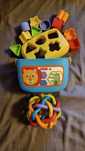 Сортер Fisher Price и топка-плетеница Playgro