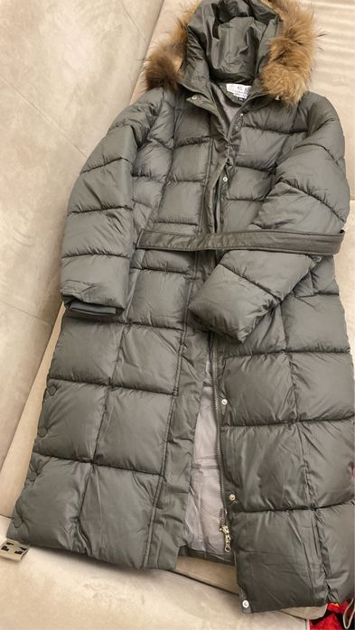 Продам новую женскую куртку размер 46 в цвете черный