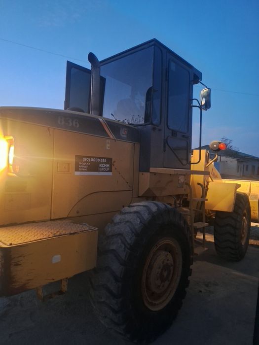 Фронтальный погрузчик 2014