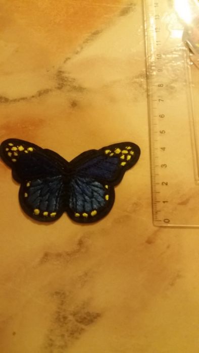 Broderie  model fluture