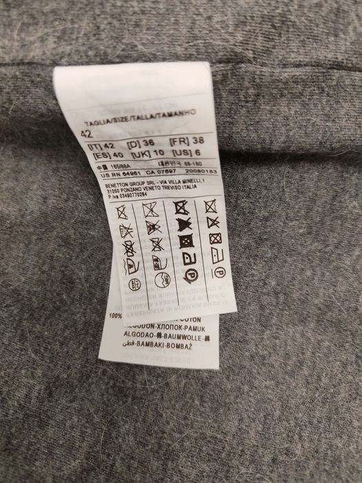 Sisley rr. 42. Сиво вълнено яке тип "байкър" със страничен цип.