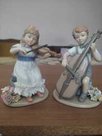 Cтатуэтки фарфоровые "Мальчик с виолончелью" и "Девочка со скрипкой"