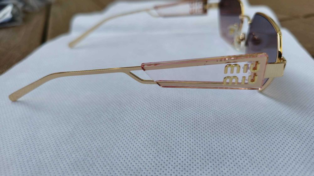 Ochelari de soare Miu Miu lentila maro, rama aurie, brat transparent