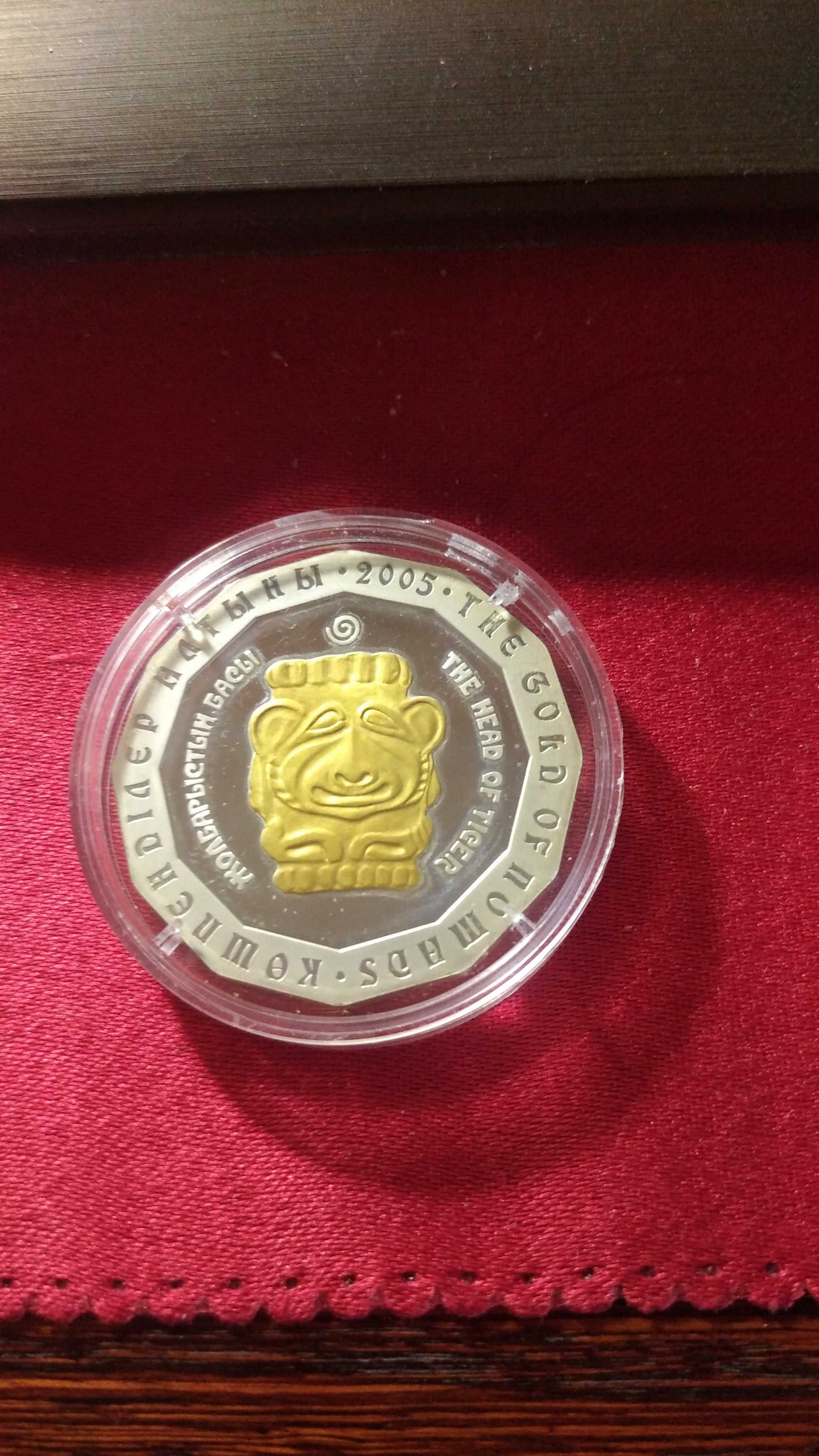 Продам срочно серебряную монету"Голова тигра", недорого
