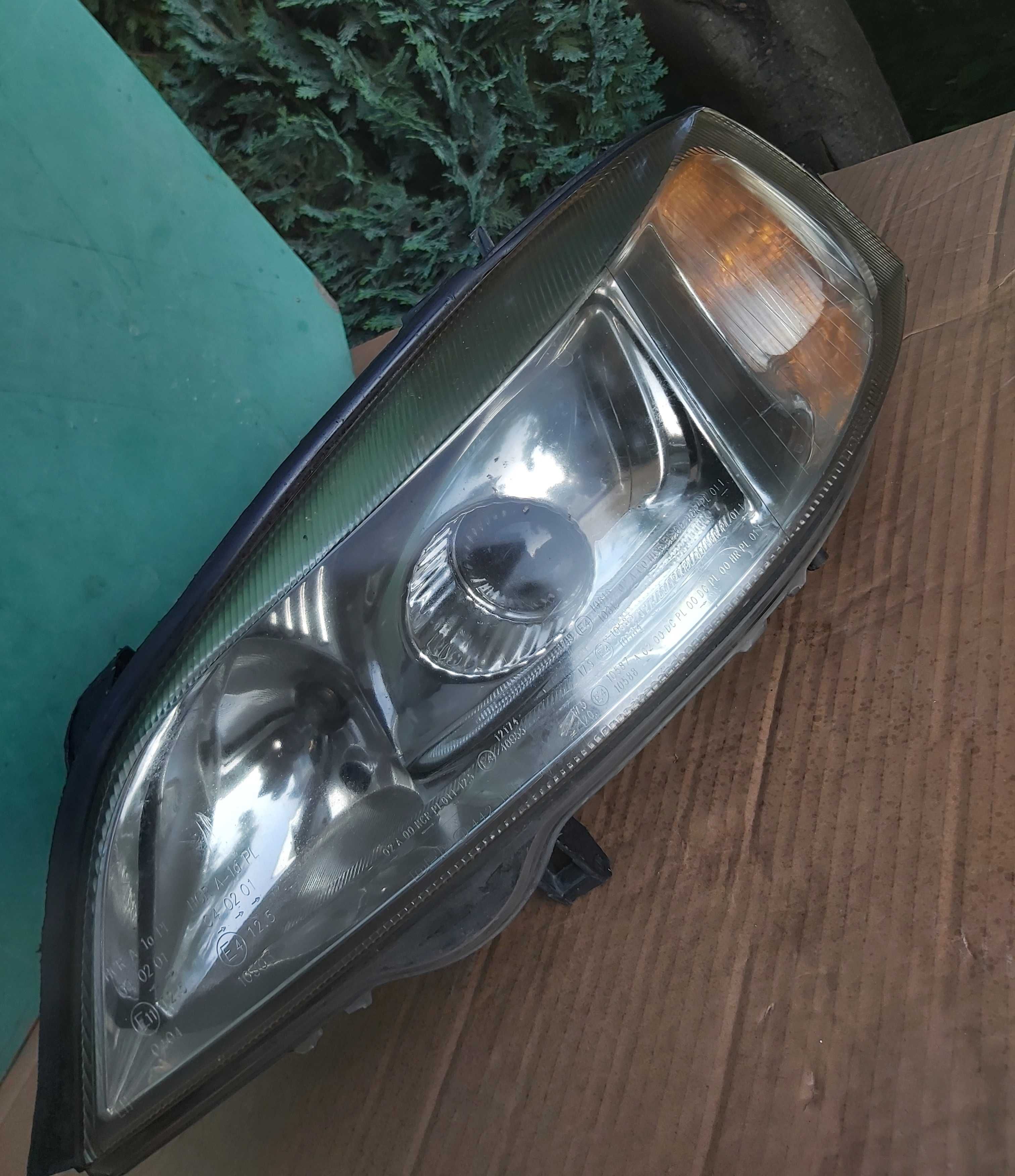 Set 2 faruri Opel Astra G cu Lupa