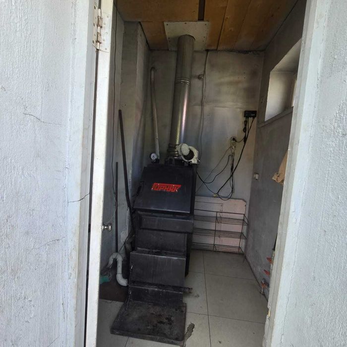 Продается четырёхкомнатный кирпичный дом в районе Карабаха.