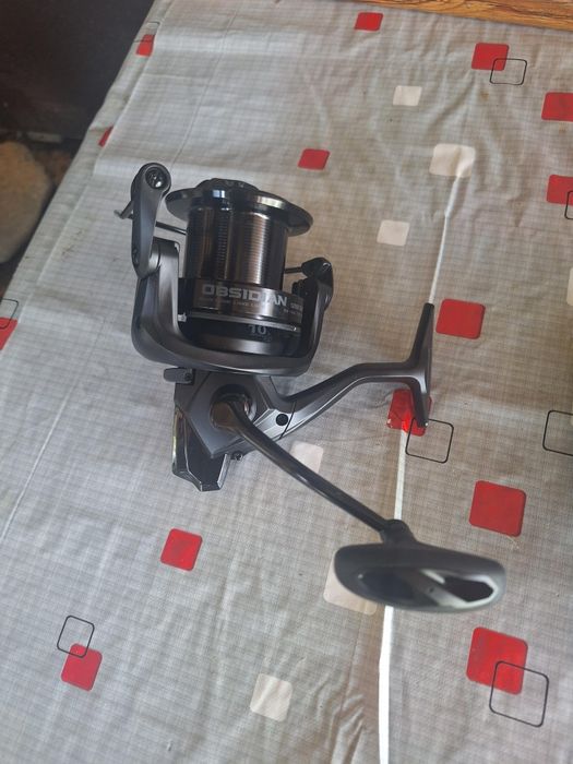 Vând mulinete Okuma Obsidian