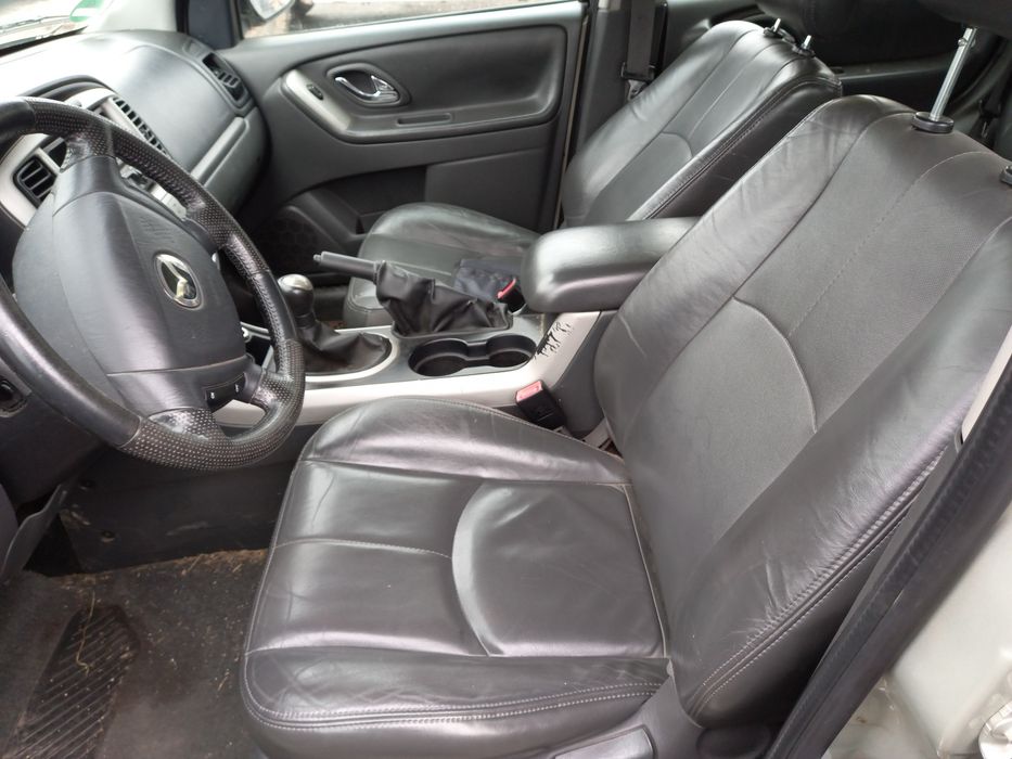 Мазда Трибют на части