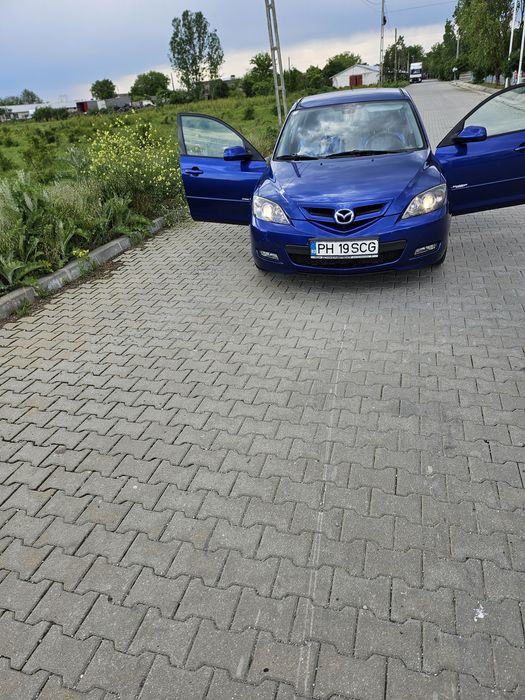 Vând mazda 3 an 2009