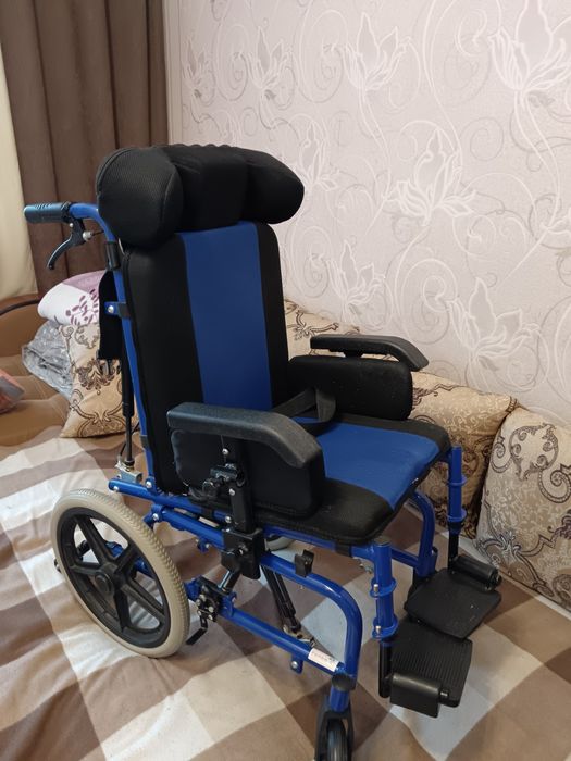 Детская инвалидная коляска