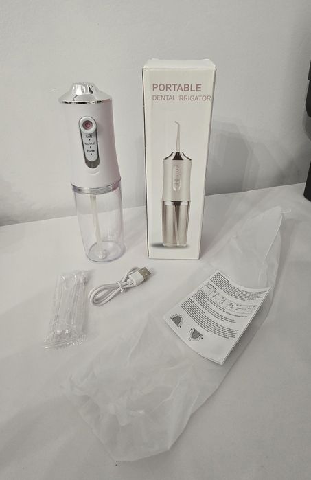 Irigator oral portabil - curățare profesională a dinților și gingiilor