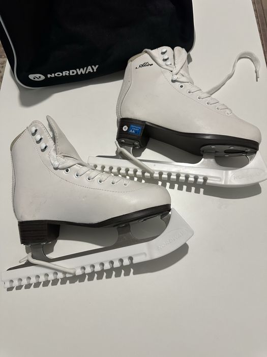 Коньки + сумка + жесчткие чехлы 35 размер