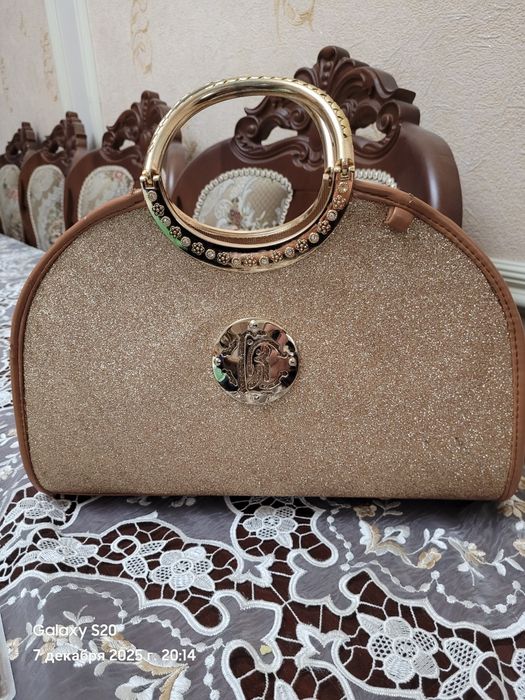 Ayollar sumkasi yangi