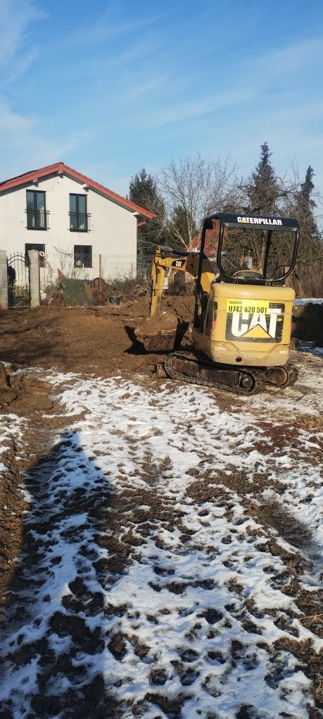 Miniexcvator fundații taluzări picon sparg betoane aduc balastru nisip