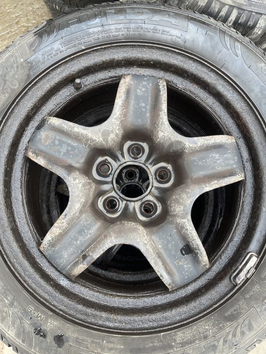 Set jante de tabla R16 originale Opel cu anvelope de iarna 205 55 R16