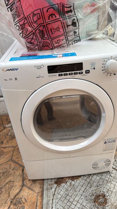 Uscator de rufe Candy 9kg