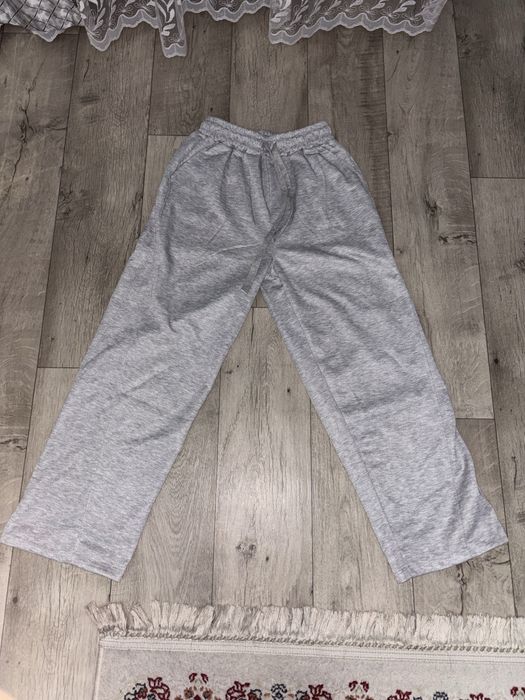 Продам серые штаны  новые