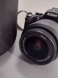 Фотоапарат Nikon D 5000 с аксесоари и батерия.