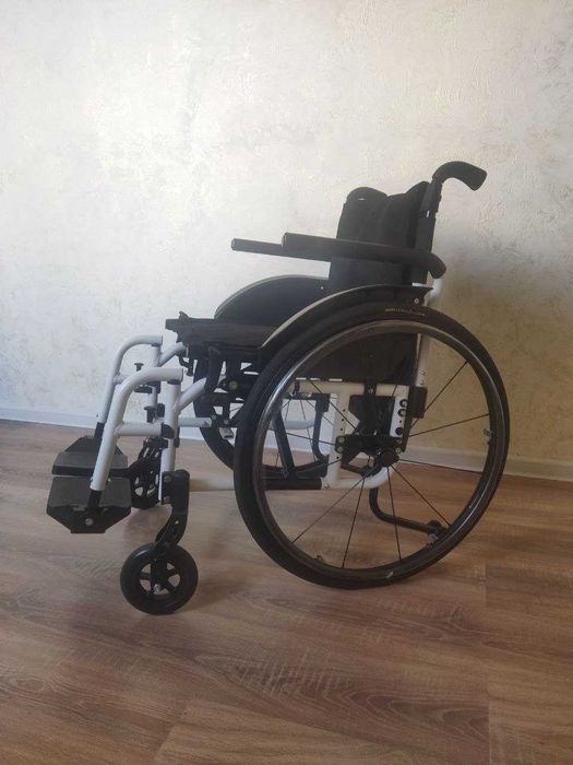 Инвалидная коляска