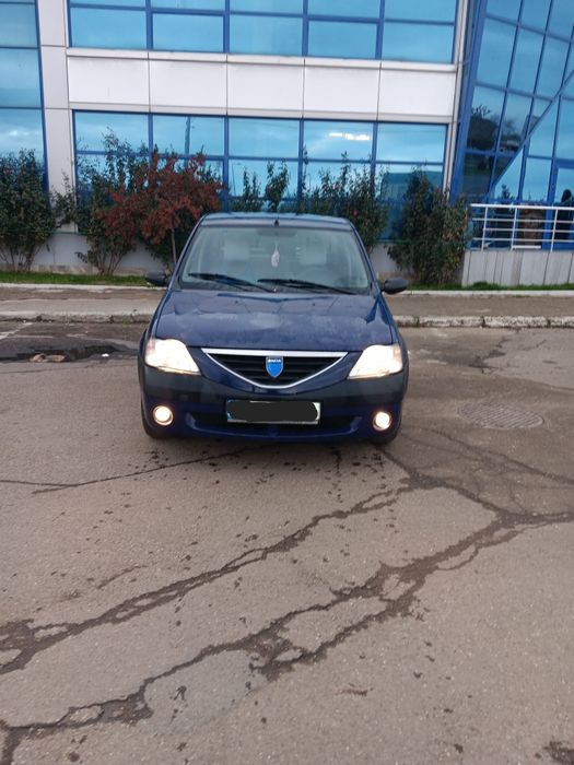 Dacia Logan   =1,6 = aer condiționat =