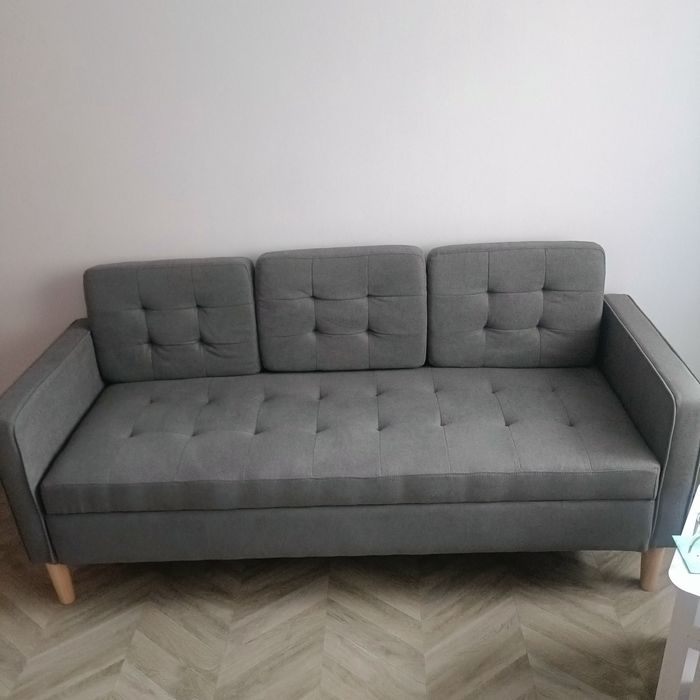 Divan impecabil cu spațiu de depozitare