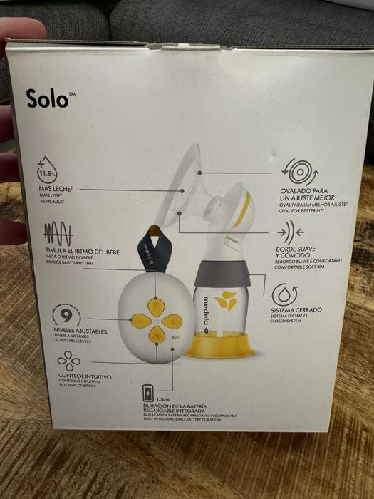 Medela Solo - Двуфазна електрическа помпа за кърма + шише и фуния