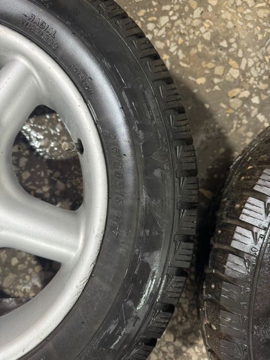 Продаю титановые диски с зимней шипованной резиной 215/60/R16