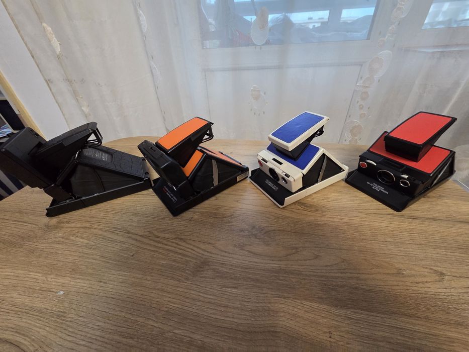 Camere pliabile polaroid SLR680 și SX-70