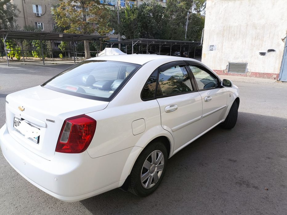 Ласетти 1.8 белый, мкп, 76800км, 2012 г.