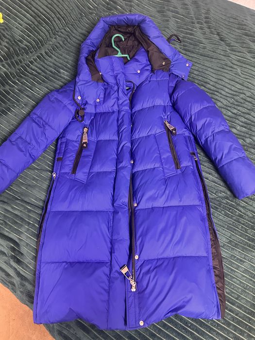 Новый пуховик,купленый,но не разу не ношенный.