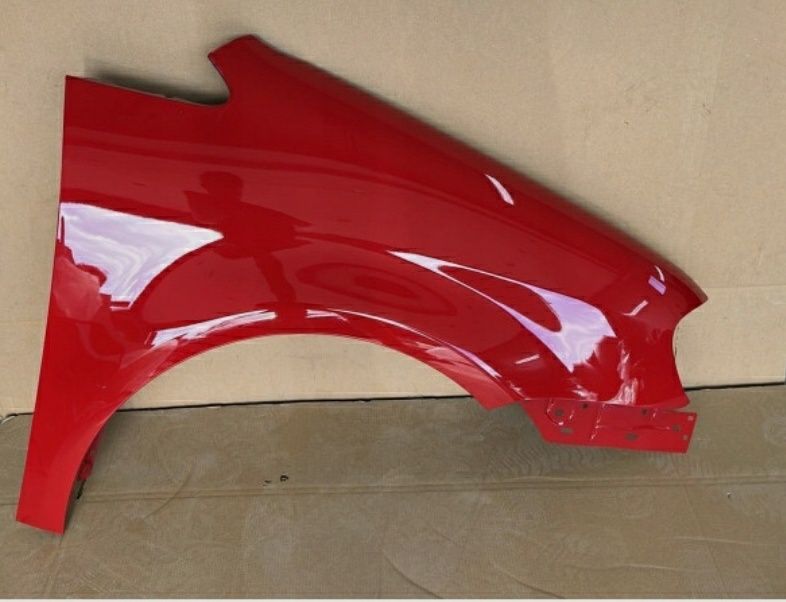 Aripa dreapta fata NOUA vopsita rosu LA3W VW Touran 2007 - 2011