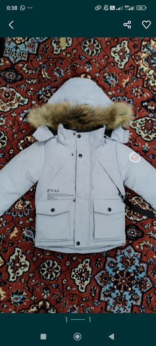 Продам пуховик детский.