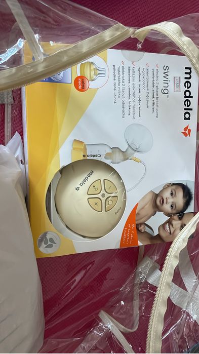 Молокоотсосот Medela