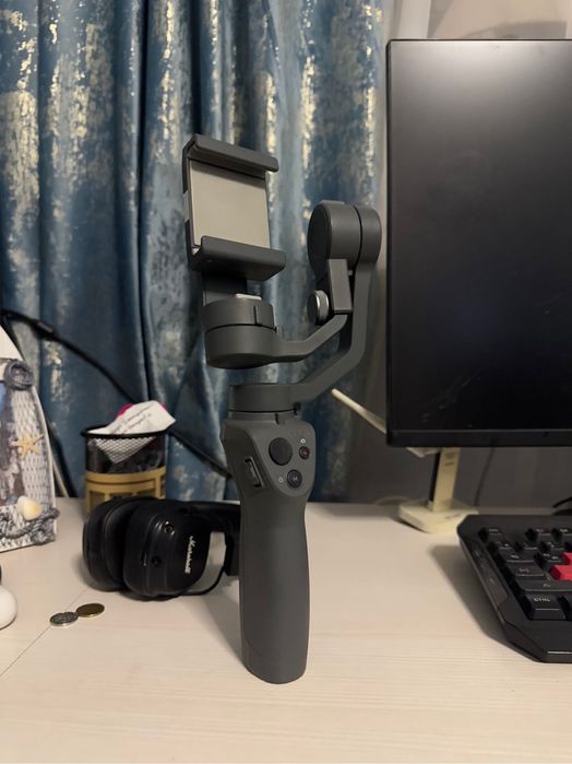 Продам стабилизатор для телефона DJI OSMO MOBILE 2