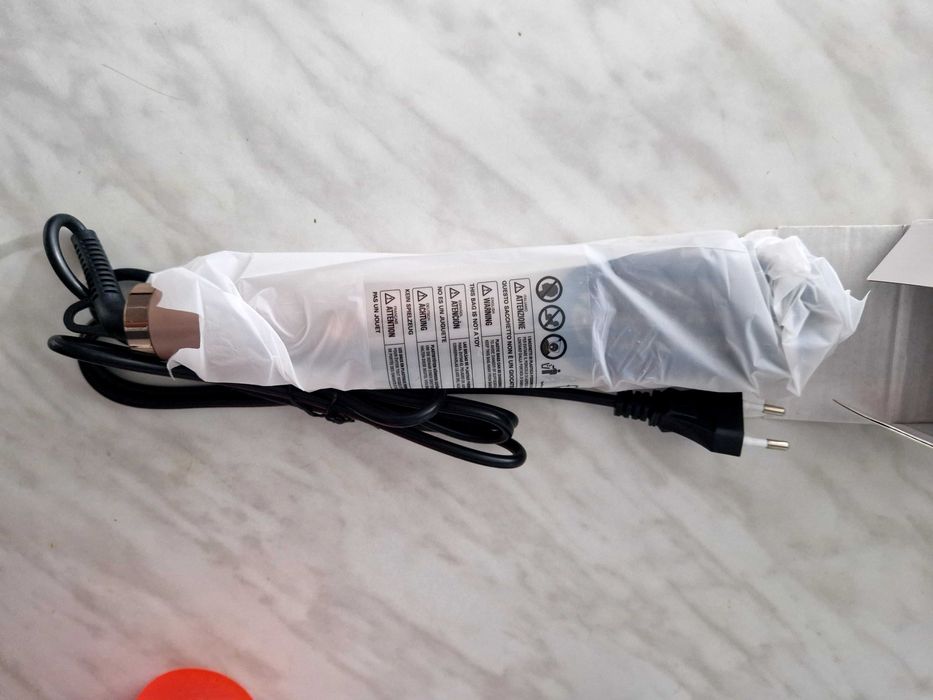 Електрическа четка за изправяне на  коса